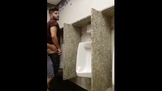 Cruising for sex and breeding a slut at a urinal while being watched