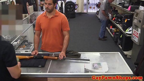 Tattooed dude jerking off at pawnshop office