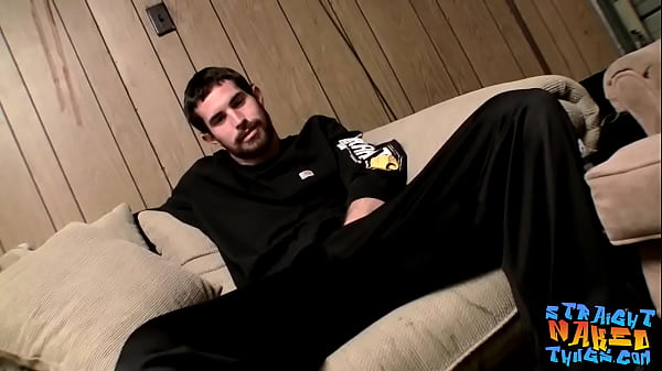 Bearded straight thug Hunter rubs his massive dick and cums