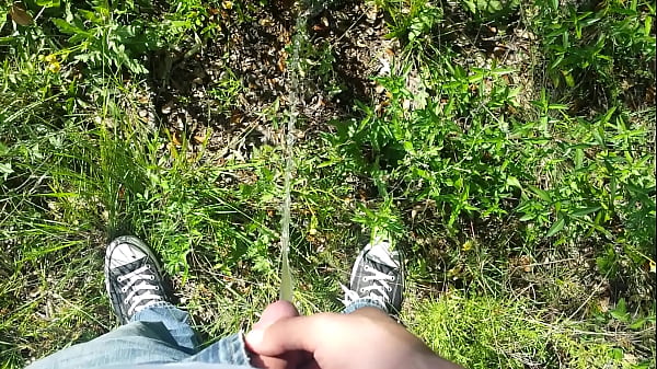 Pissing outdoors on a sunny day