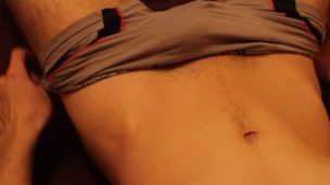 Young fit shaven guy masturbates with a huge load