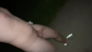 Teen boy takes a walk outside naked.
