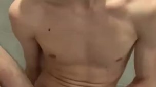 Barely legal twink boy with fat dick is playing with his dildo in the bathroom