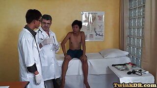 Asian skinny amateur twink in BJ 3some with doctors