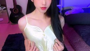 A cute femboy masturbates in satin and can't help but orgasm a lot