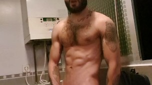 Muscular man has romantic sex in the kitchen