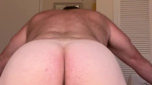 Solo Sexy Bear Maxwell Coxx in a tiny g-string playing with his cock and ass