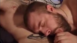 Hung tattooed fuck blowing his raw load in his hairy buddy's mouth.