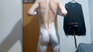 Covering my skinny body with white cream and folding over to suck my cock self suck